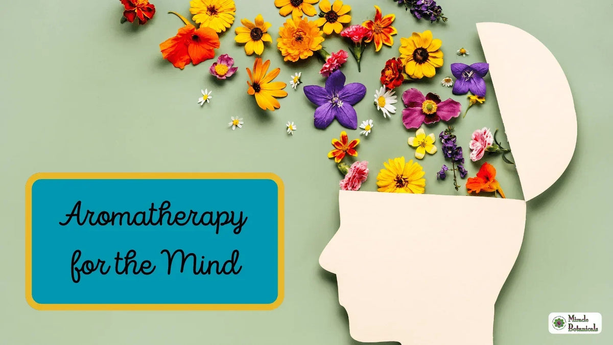 Paper head silhouette with an open top spilling colorful flowers, with text: Aromatherapy for the Mind