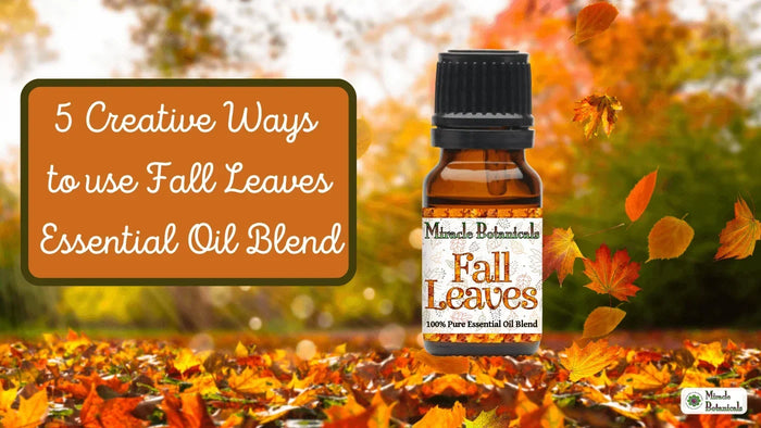 Miracle Botanicals Fall Leaves essential oil blend among autumn leaves, with text: 5 Creative Ways to Use Fall Leaves