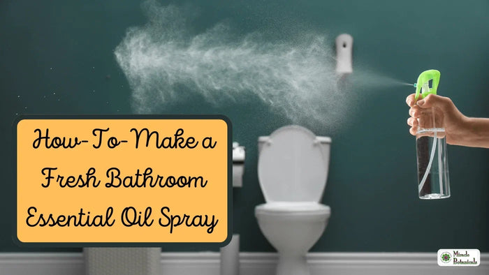 Hand spraying a clear spray bottle into a bathroom with a toilet, with text: How-To-Make a Fresh Bathroom Essential Oil Spray