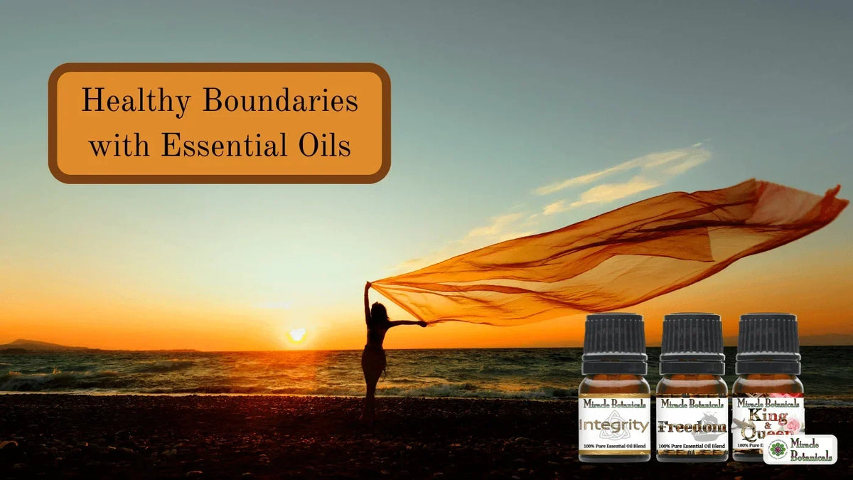 Silhouette of a woman on a beach at sunset holding flowing orange fabric, with Integrity, Freedom and King & Queen blend bottles