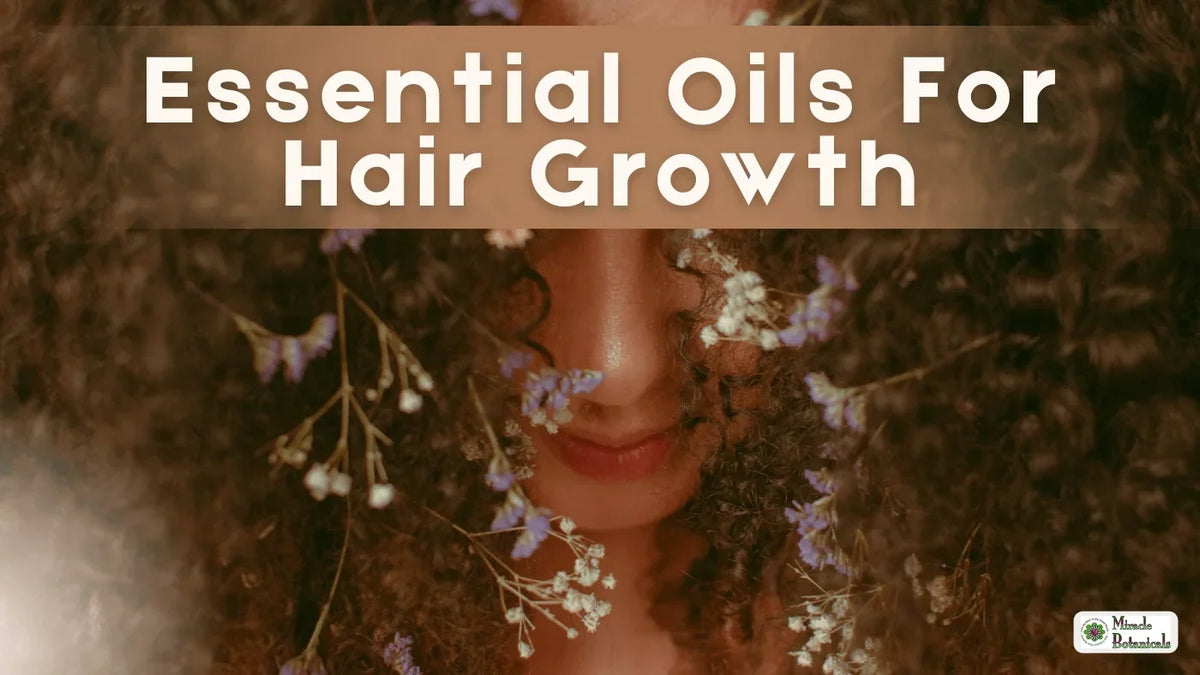 Essential Oils for Hair Growth, with image of a woman with beautiful thick curly hair and flowers in her hair