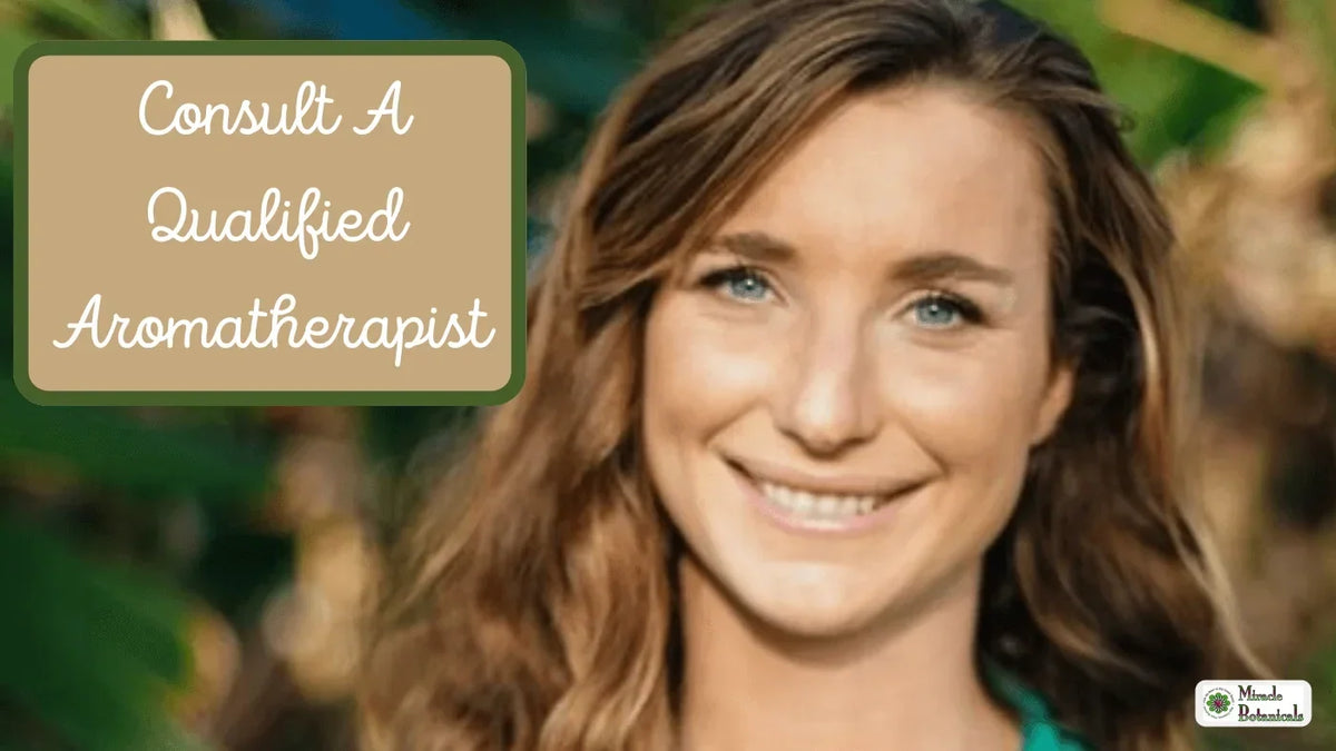 Smiling woman with wavy brown hair outdoors, with text: Consult A Qualified Aromatherapist