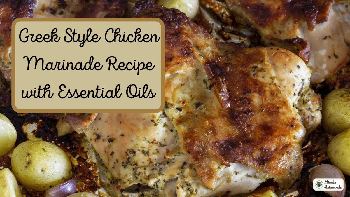 Roasted herb-seasoned chicken with baby potatoes, with text: Greek Style Chicken Marinade Recipe with Essential Oils