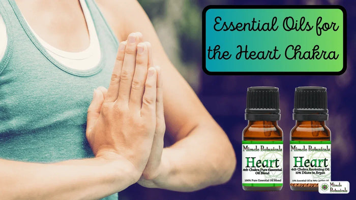 Hands in prayer pose beside Heart 4th Chakra blend and anointing oil bottles, with text: Essential Oils for the Heart Chakra