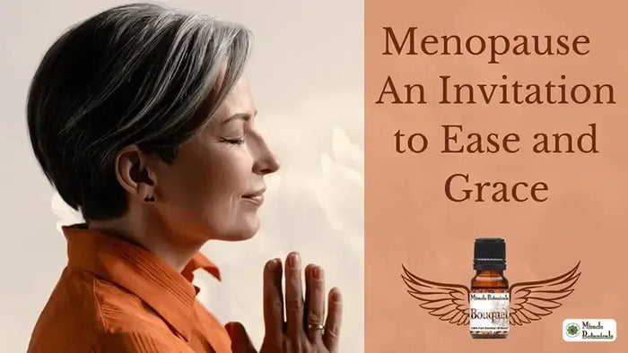 Gray-haired woman with eyes closed, hands in prayer, beside a Bouquet blend bottle, with text: Menopause, An Invitation to Ease and Grace