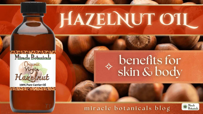 Organic virgin hazelnut oil bottle in front of a pile of whole hazelnuts