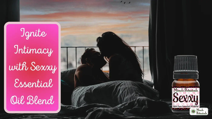 Silhouetted couple kissing in bed by a sunset window beside a Sexxy blend bottle, with text: Ignite Intimacy with Sexxy Essential Oil Blend