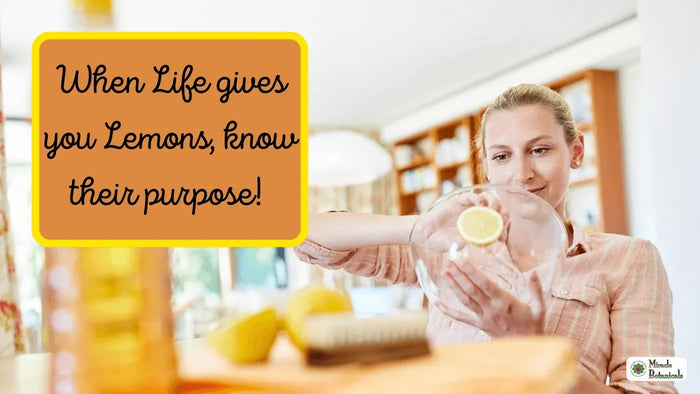 Woman cleaning a glass bowl with half a lemon, with text: When life gives you lemons, know their purpose!