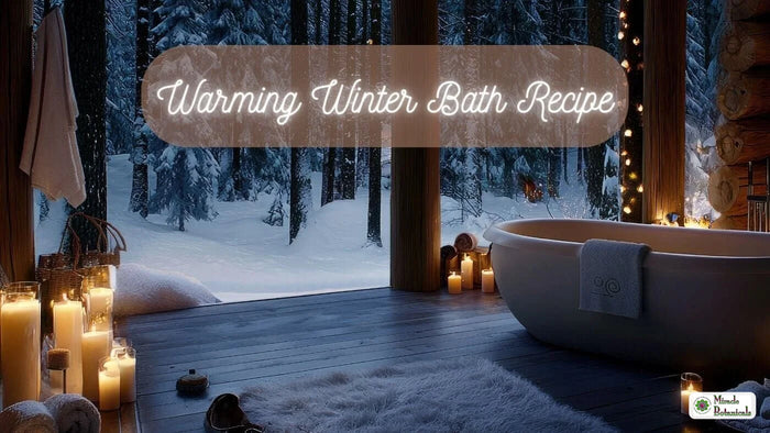 Candle-lit freestanding bathtub facing a snowy forest at night, with text: Warming Winter Bath Recipe